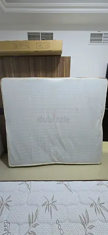 A neat and clean king size spring mattress