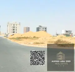 Residential and commercial lot at the corner of two streets (G+4) in Global City, Al-Aaliya, Ajman;