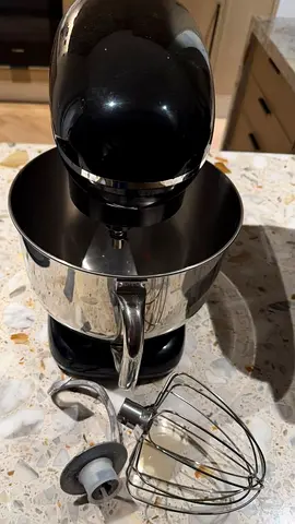 Black stand mixer with stainless steel bowl — used, working