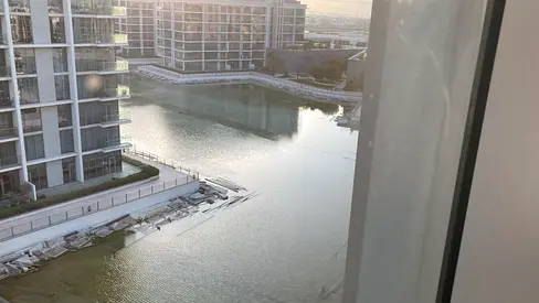 Lagoon & Skyline View | 1BR Apartment | Modern Open-Plan Layout