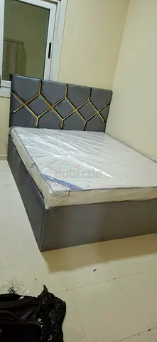 Stylish new queen size bed with mattress available