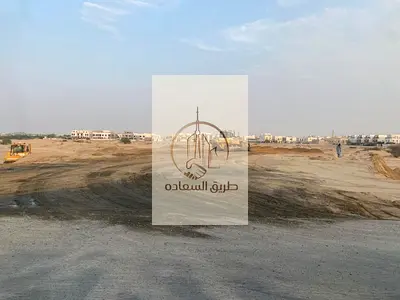The cheapest plot of land in the Al-Ruwaydat area—an unmissable price for a vast expanse.