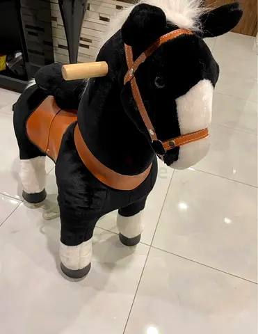 Plush Ride-On Pony for Toddlers with Wooden Handles and Saddle