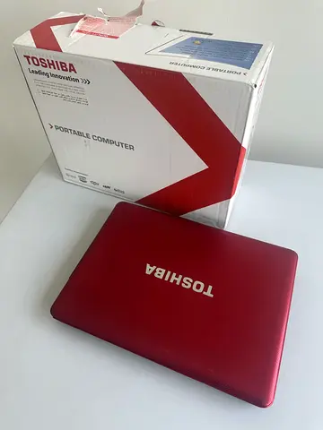 Toshiba red laptop with original box - portable computer