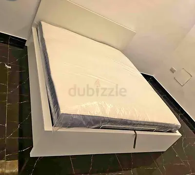 Ikea hydraulic bed with mattress queen size