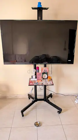 55-inch LED TV on Mobile Floor Stand with Shelf (Good Working Condition)