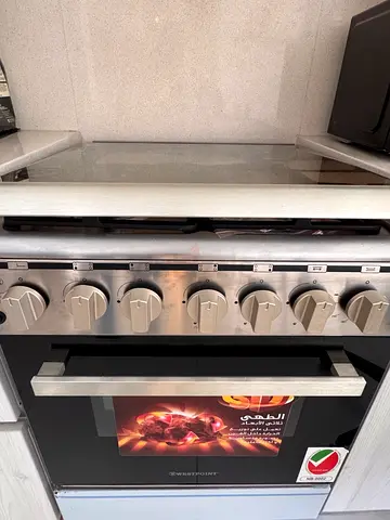 NEW - NEVER USED ! 4 burner Stainless Steel Free-standing Gas Cooker with Oven