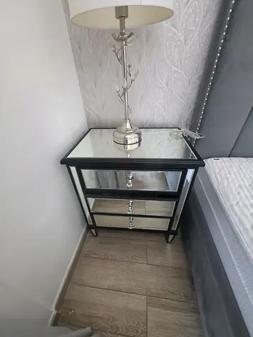 Available high quality bed with side table and dressing table like new