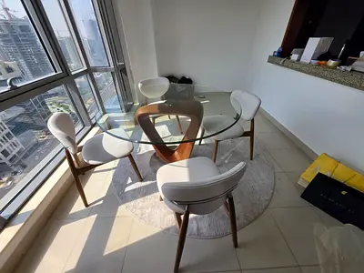 Available high quality top glass dining table with chairs like new