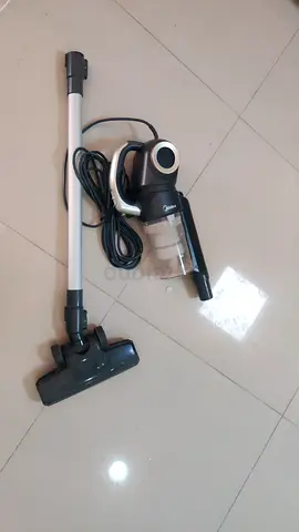 Lightweight vacuum cleaner with cord (1 unit) — good working condition