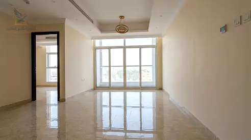 For annual rent: Two-bedroom apartment in Al Rawda 2, Ajman. Features include two bathrooms, a larg