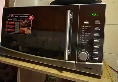 Sanford Stainless Steel Microwave Oven - Good Working Condition plus used for baking