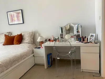 White dressing vanity table with 1 drawer, 2 shelves.Used, good condition. Sold without the mirror.