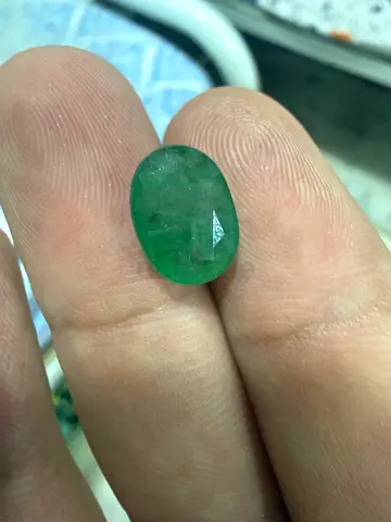 Natural oval green emerald gemstone - loose cabochon