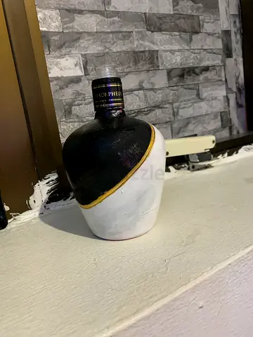 Self painted bottle for home decor