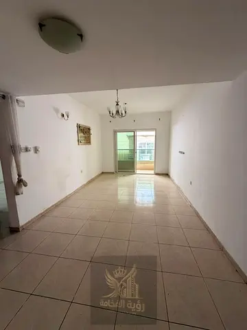 One-bedroom apartment with a living room available for annual rent in Al Qasimia, Al Mahatta, near D2D, in a prime and lively location close to variou