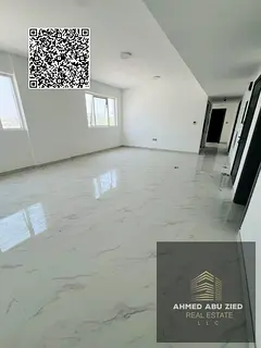 Commercial office for annual rent in Al Muwaihat 3, on the main road, suitable for all activities, 2