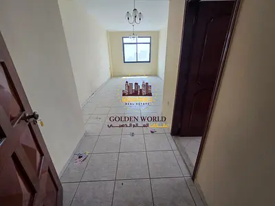 Affordable 1BR apartment for rent in Al Qasimia, Al Mahatta, with free AC, spacious layout, stunning view, near the Amiri Diwan.