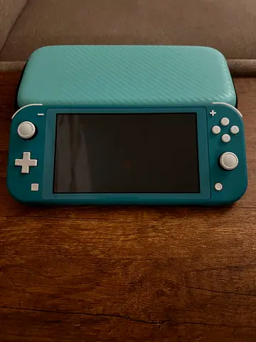 Nintendo Switch Lite (Turquoise) - Good condition, screen intact + 4 GAMES