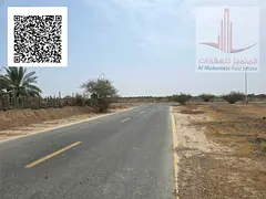 Own a residential corner plot on two streets in Manama 9 - The land area is 5500 sq ft - An opportun