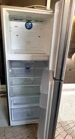 Used tall silver fridge-freezer, good working condition