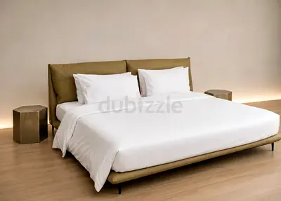 King size low-profile leather bed frame with cushioned headboard
