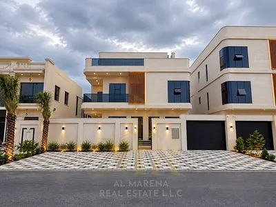 An exceptional opportunity to own the home of your dreams: a luxurious villa in Al Alia, Ajman, featuring high-end finishes, two floors, and a rooftop