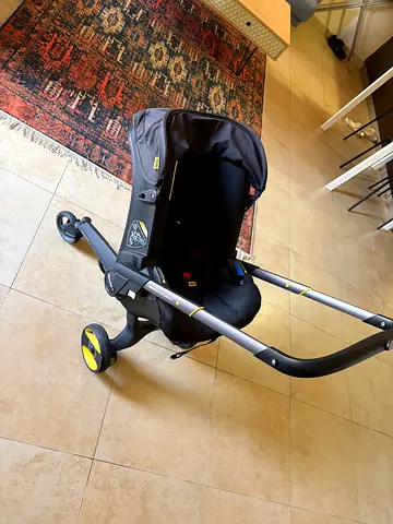 Doona Infant Car Seat + Integrated Stroller (Black) - Used, Good Condition