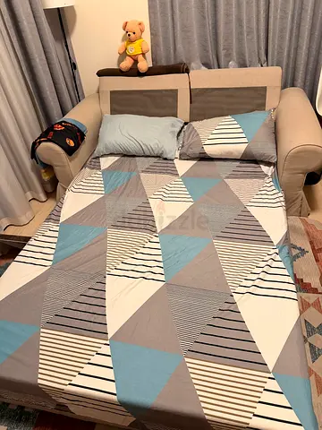 Comfortable IKEA 2-seater sofa with queen bed