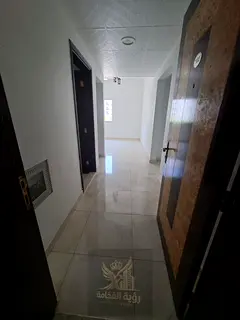 A one-bedroom apartment with a living room is available for annual rent in Al Qulayaah, Sharjah, in 