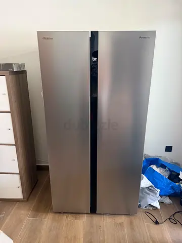 Panasonic stainless steel side-by-side refrigerator in perfect condition