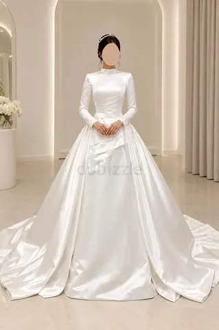 Custom-Made Wedding Dress — Never Worn

Made-to-measure satin wedding dress, high neck, long sleeves