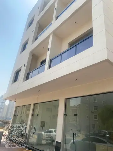 بناية زاوية للبيع في عجمان منطقة العالية سكني تجاري ارضي وثلاثة ادوار
