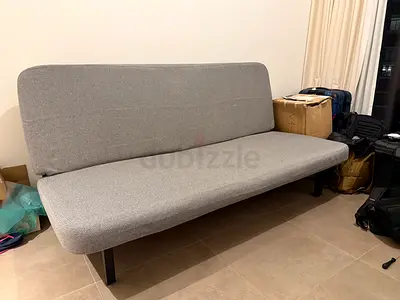 IKEA grey 3-seater sofa bed in good condition