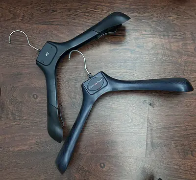 Pair of black suit hangers