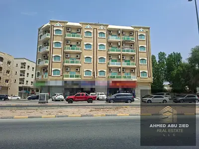 Residential and Commercial Investment Building for Sale in Al Mowaihat 3 with 8.23% ROI, Corner Plot on Two Streets, Annual Income AED 1.44M