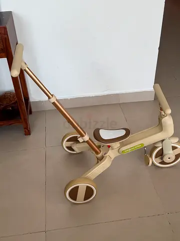 baby tricycle and jumper