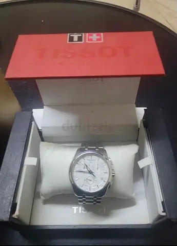 Tissot men's stainless steel wristwatch with box