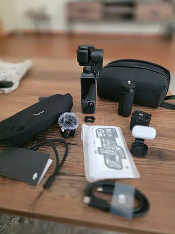DJI Osmo Pocket 3 (compo) + accessories kit — case, mic, cables, mounts