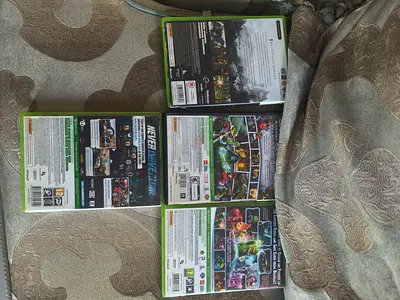 Lot of 4 Xbox 360 game cases (used) - assorted titles