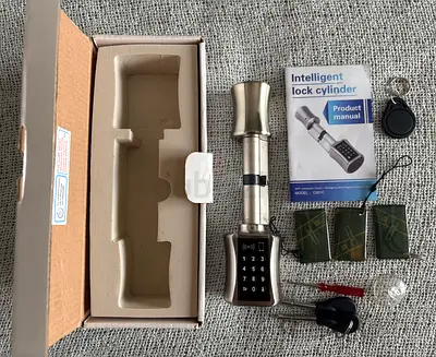 Smart electronic door lock cylinder with keypad, RFID tags and keys