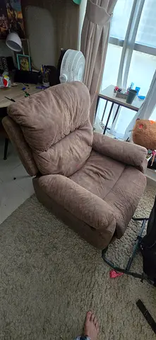 Comfortable single-seater recliner armchair in beige/brown - used condition