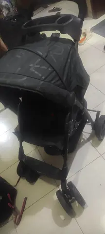Used lightweight baby stroller - single seat, folds