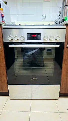 Bosch 4 burner top gas oven electric latest model same like new condition