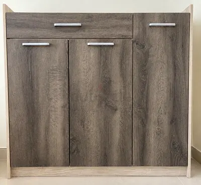 Grey wooden storage cabinet with 3 doors and top drawer - Perfect condition