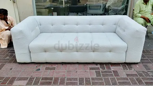 Modern tufted 3-seater sofa in light grey - good condition