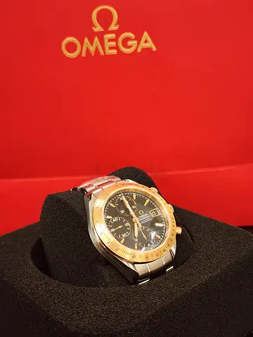 Omega Speedmaster two-tone chronograph men's watch in box with 24 months service warranty from Omega
