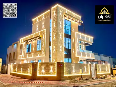 Luxury villa for sale directly from the owner, featuring a private pool and including electricity and water services. It boasts a prime location direc