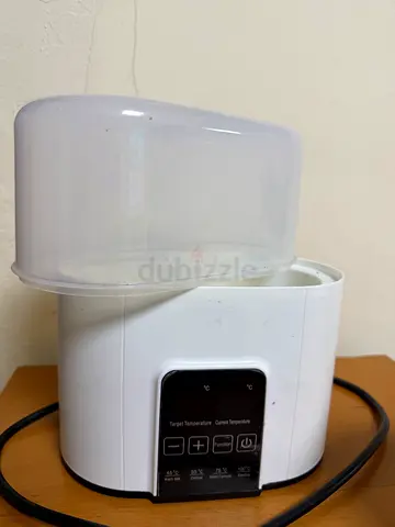 Milk warmer and sterilizer