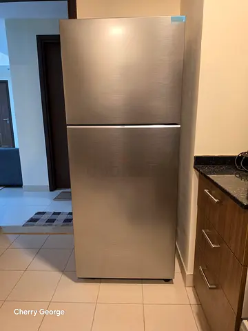 Stainless steel top-freezer refrigerator - Excellent condition